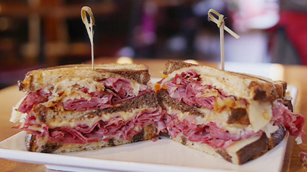 Sandwich on a plate with toothpicks